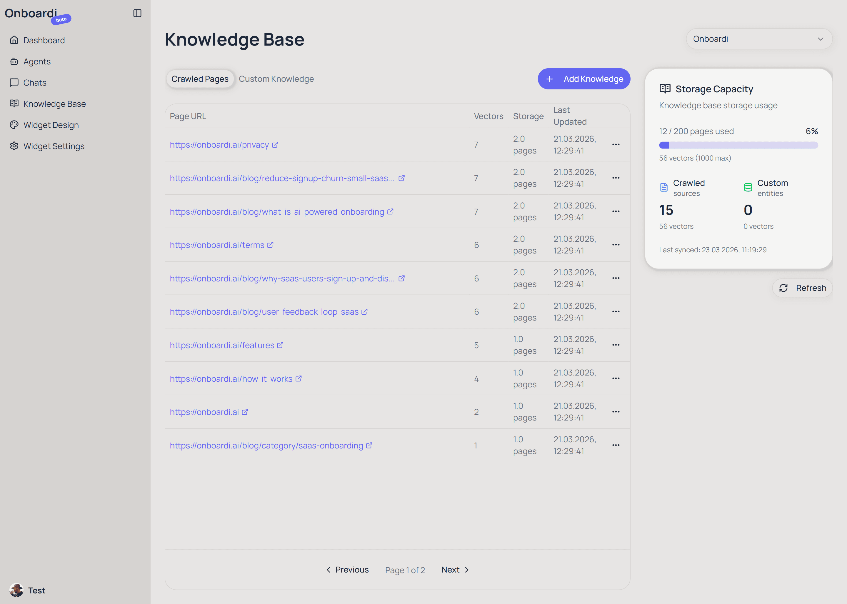 Screenshot: Knowledge Base page with crawled pages table